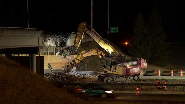 Crews demolish damaged I-90 overpass after truck strike
