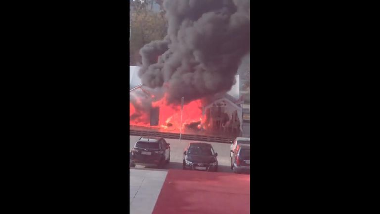 Shots fired outside Serbian parliament as fire breaks out