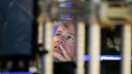 Wall Street's feverish rally takes a break as US stocks and gold pull back from their records