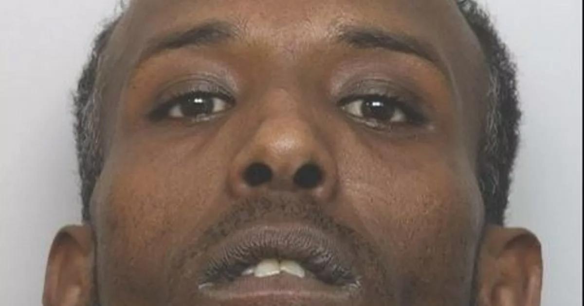 The face of a "despicable" fake cop who scammed a lady in her 90s