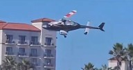California helicopter crash: Aircraft plummets from sky as beachgoers watch in horror