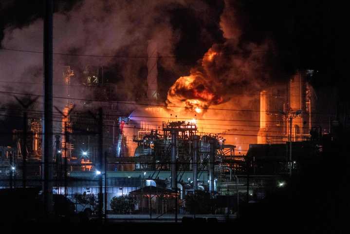 Flames visible for miles as Chevron refinery burns in California