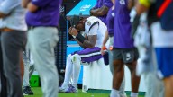 John Harbaugh is mum on Lamar Jackson's injury