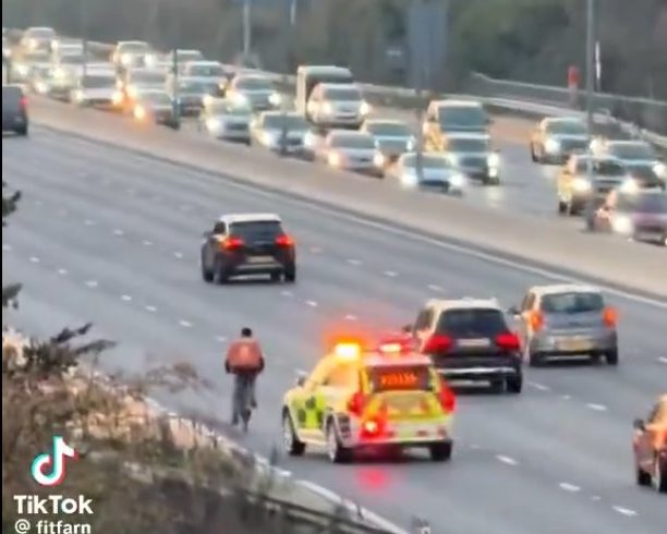Scary moment food delivery cyclist seen illegally riding along a busy motorway