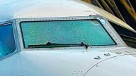 United Airlines flight makes emergency landing after a mysterious object hits windshield at 36,000 feet