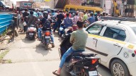 Encroachments stall traffic at Diva railway crossing despite open gate