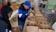 Food banks and community groups brace for spike in demand as shutdown continues