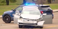 4 injured, 2 in custody after carjacking