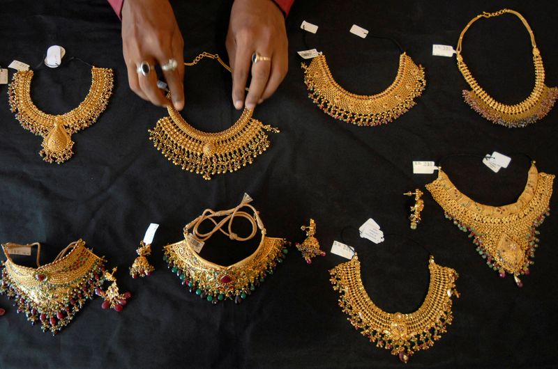Gold builds on historic rally, soars past $4,000/oz  for first time