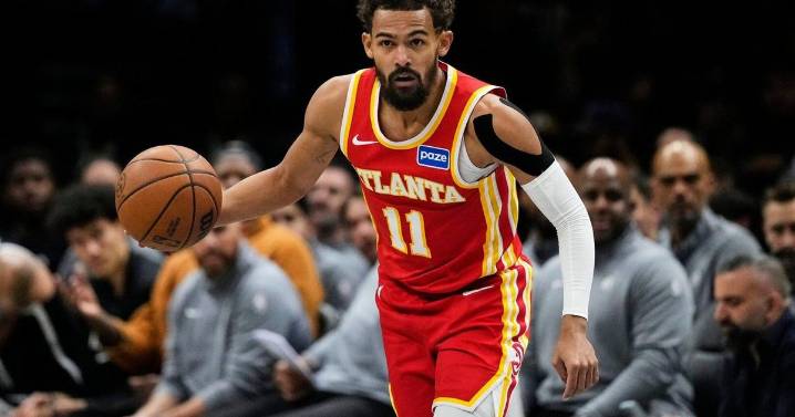 Hawks' Trae Young suffers sprained right knee vs. Nets