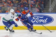 Deadspin | Oilers find scoring touch, hold off Canucks