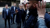 Former French President Sarkozy accompanied by police officers overnight as he starts prison sentence