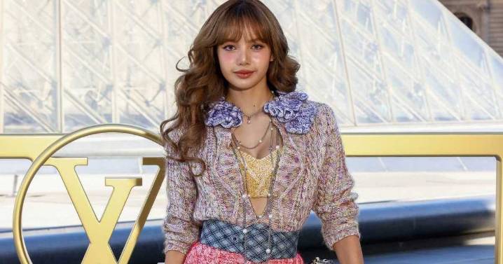 Blackpink’s Lisa Masters Colors & Patterns in Fully-Knit Louis Vuitton Ensemble in Paris Photos