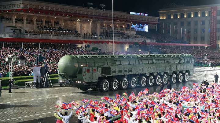 Kim Jong Un shows off new ballistic missile at Pyongyang military parade