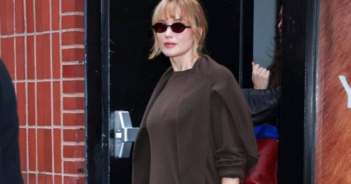 Jennifer Lawrence Keeps It Cozy-Chic at NYC Store Launch