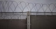 Police search for two men who absconded from open prison
