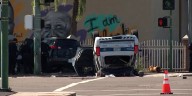 2 officers, 1 other hospitalized after police vehicle rolls over in Phoenix