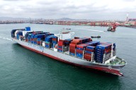 China Rejects Trump’s 100% Tariff Threat