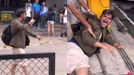 Indian Man Waves Pistol-Shaped Lighter At People In Bangkok, Cries After Being Dragged By Security; Arrested – VIDEO
