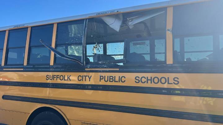 Suffolk crash injures 4 kids in school bus, cement truck collision