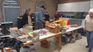 Mustangs Care Group giving food to students in need