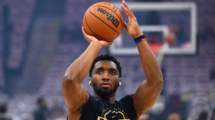 Cavs starters go through warmups before playing Bucks in home opener