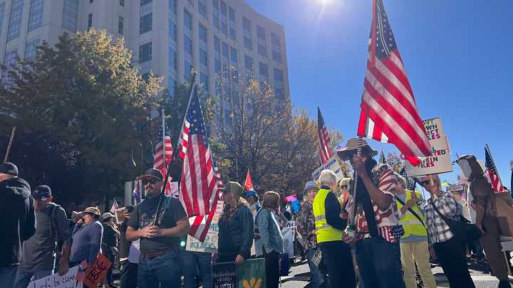 No Kings rally protesters march up Virginia Street