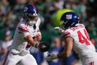Giants' Cam Skattebo carted off field with apparent foot injury