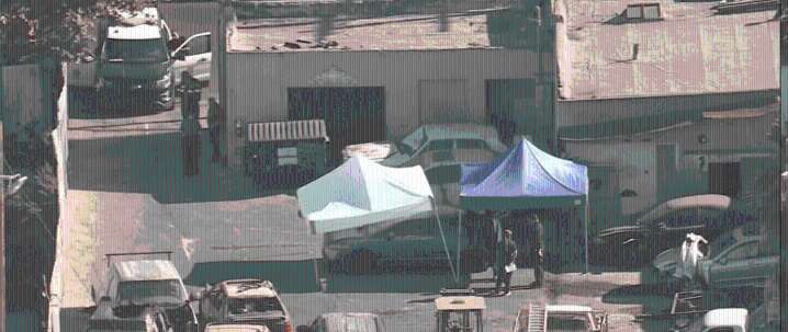 LAPD: Woman Arrested, Charged After Body Found in Car Trunk