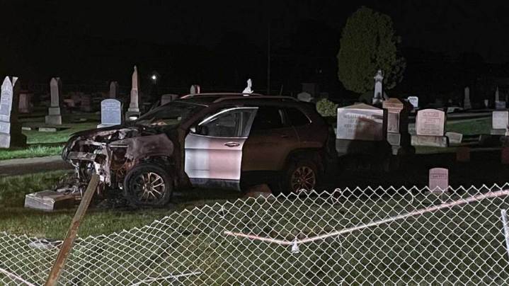 Car catches fire after crash into Austintown cemetery