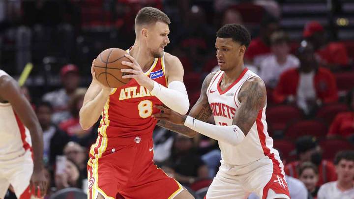 Watch Kristaps Porzingis bank his first bucket with the Hawks