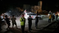 La devolución de los cadáveres pone en riesgo el alto el fuego en Gaza mientras los palestinos esperan la ayuda humanitaria