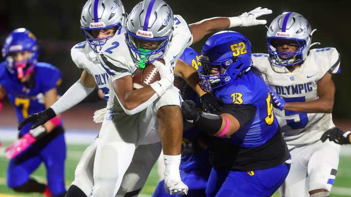 Webster's 315 rushing yards pushes Olympic football past Bremerton