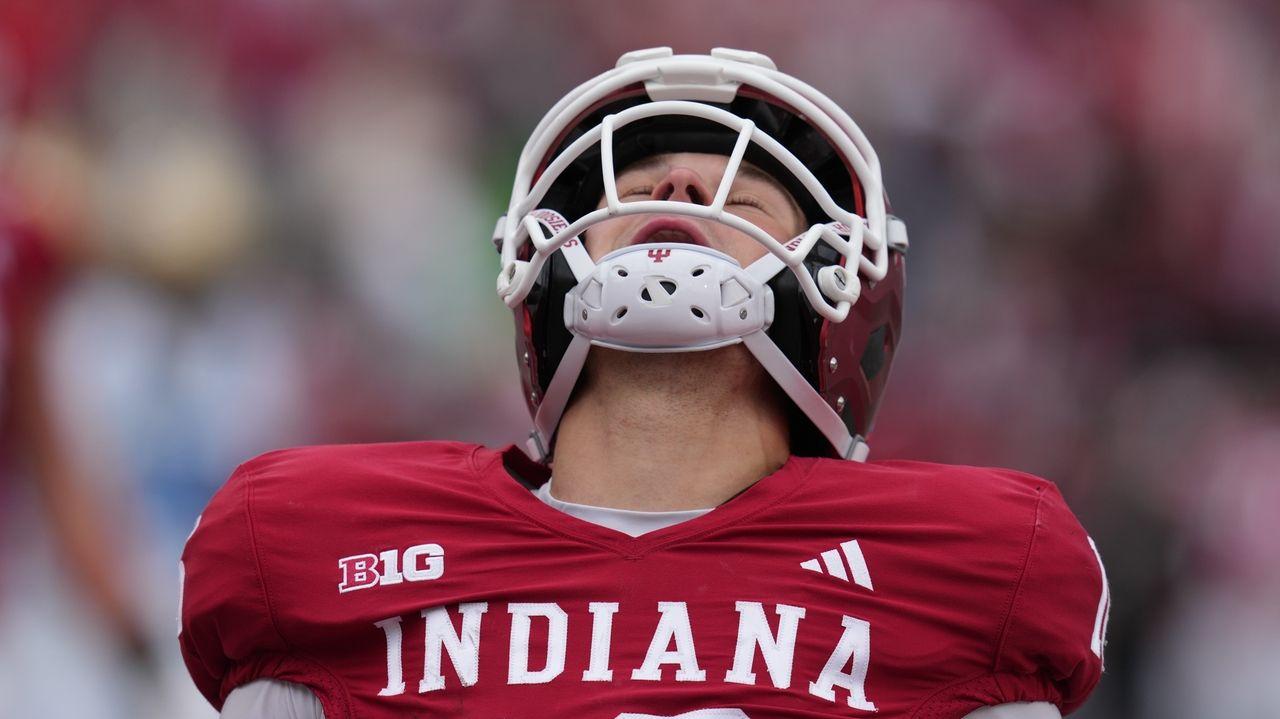 The Latest: BYU cracks the top 10 of the AP Top 25, LSU drops out