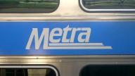 Metra Electric trains stopped due to vehicle stuck on tracks
