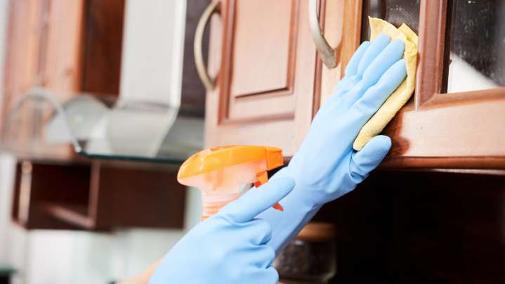 The Popular Household Cleaner To Avoid Using On Grimy Kitchen Cabinets And Why
