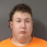 Authorities say Clinton man killed his mother, burned her body