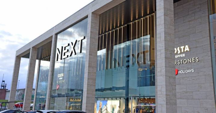 Next boosts profit forecast as sales beat expectations