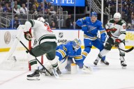 Wild deliver Hartman attack to Blues in opener