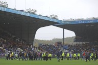 Sheffield Wednesday fans enter pitch to protest against club ownership