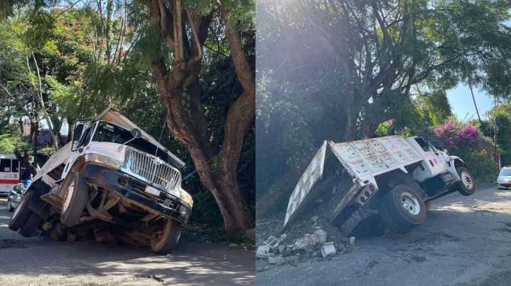 Camión de volteo cae en un socavón en la colonia Lomas de San Antón, Cuernavaca