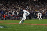 Polanco hits winning single in the 15th inning as the Mariners beat the Tigers to advance to ALCS