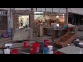 Globe business owner gives a tour of devastation left behind by flash flooding