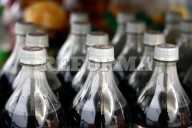Queda impuesto a refrescos  lejos de estándar internacional