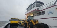 Ferries bring more equipment and crews to help Highway 12 clean