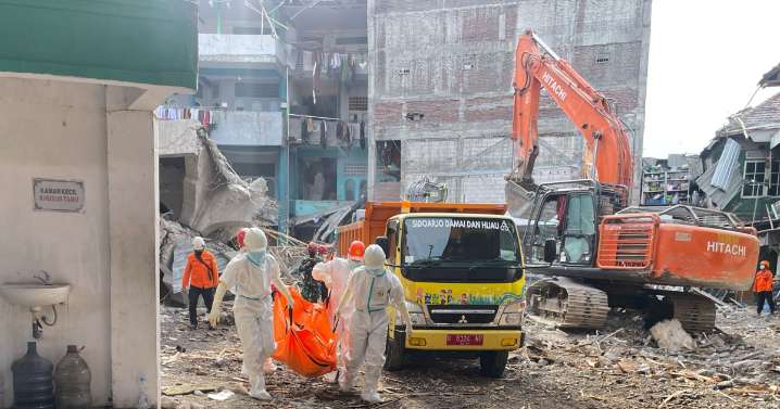 Rescuers search for missing students after Indonesian school collapse kills 49