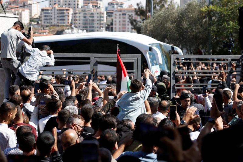 Hamas hands over all living hostages to Israel, Trump says Gaza war over