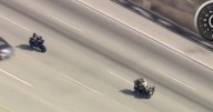 Suspect in deputy's shooting flees on motorcycle, reaches speeds over 120 mph, crashes on freeway