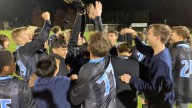 Watch Lansing Catholic boys soccer celebrate regional title