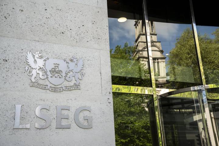 FTSE 100 nudges higher but weak data dents pound